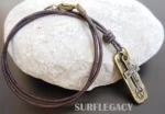 BURDEN-OF-PROOF MENS CROSS PENDANT ON LEATHER