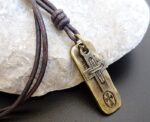 BURDEN OF PROOF MENS CROSS PENDANT ON LEATHER