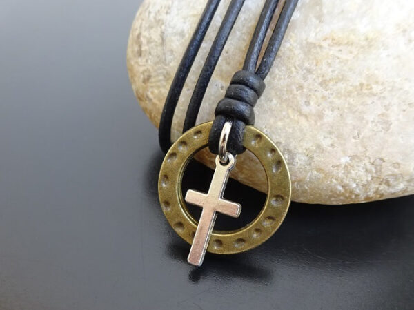 cross pendant on leather
