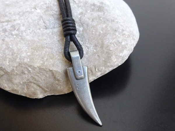 horn pendant on leather