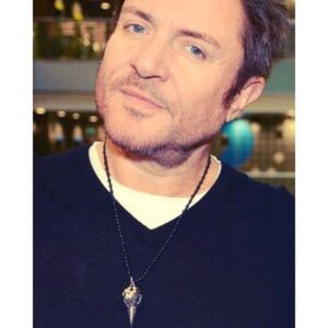 SIMON LE BON WEARING A RAVEN PENDANT