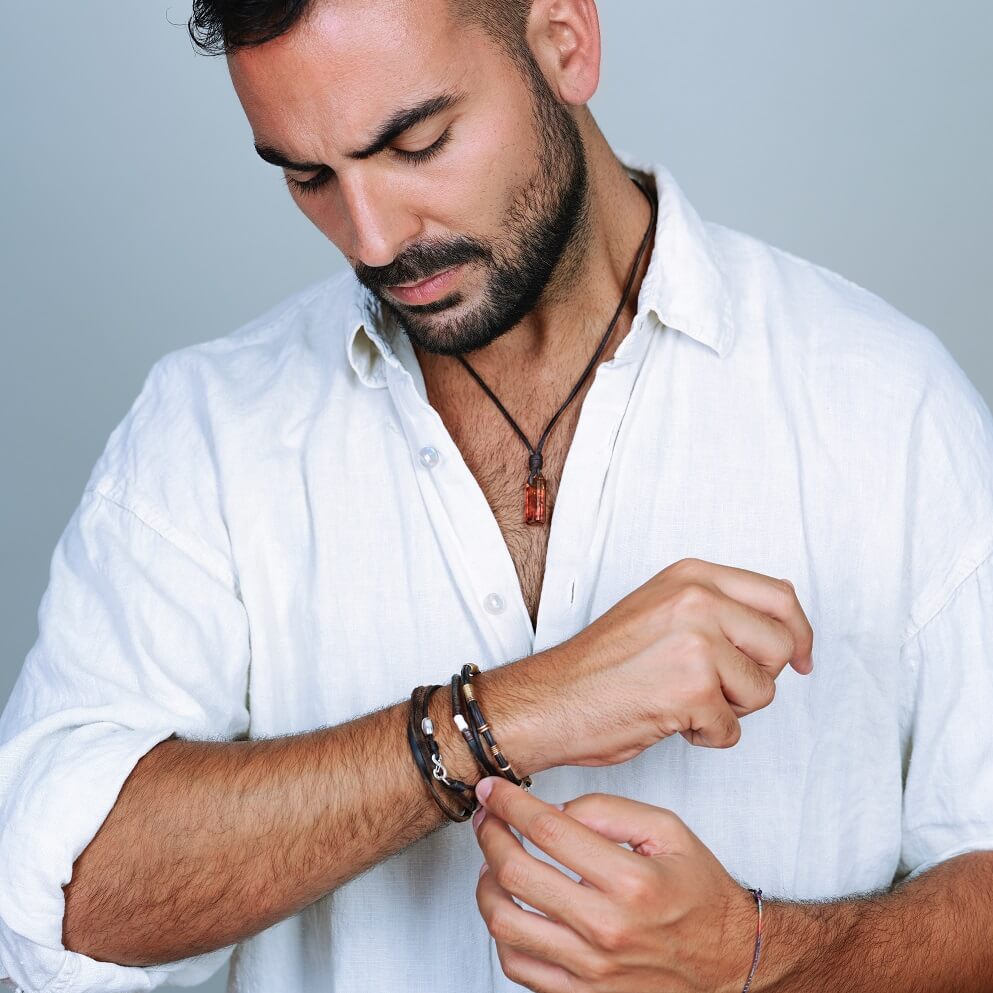 MAN WEARING BRACELETS