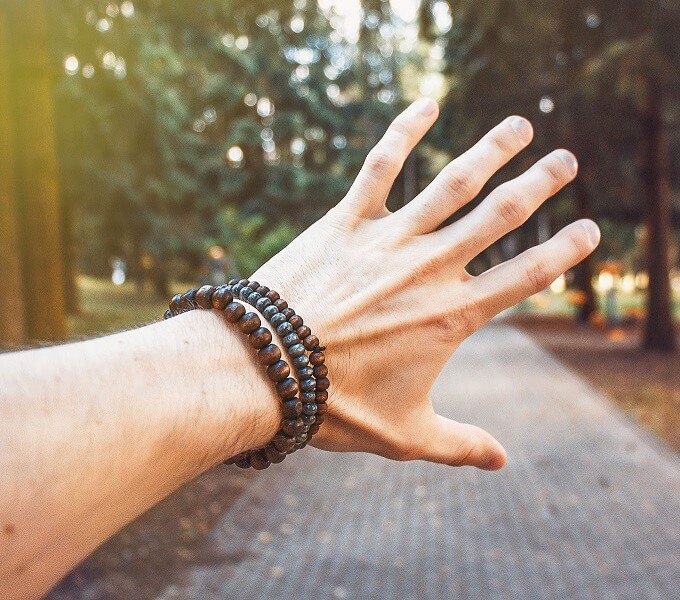 hand with stacked bracelets Jonas Svidras