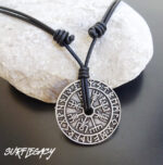 VEGVISIR NECKLACE ON SLIP KNOT PICTURED ON HAND